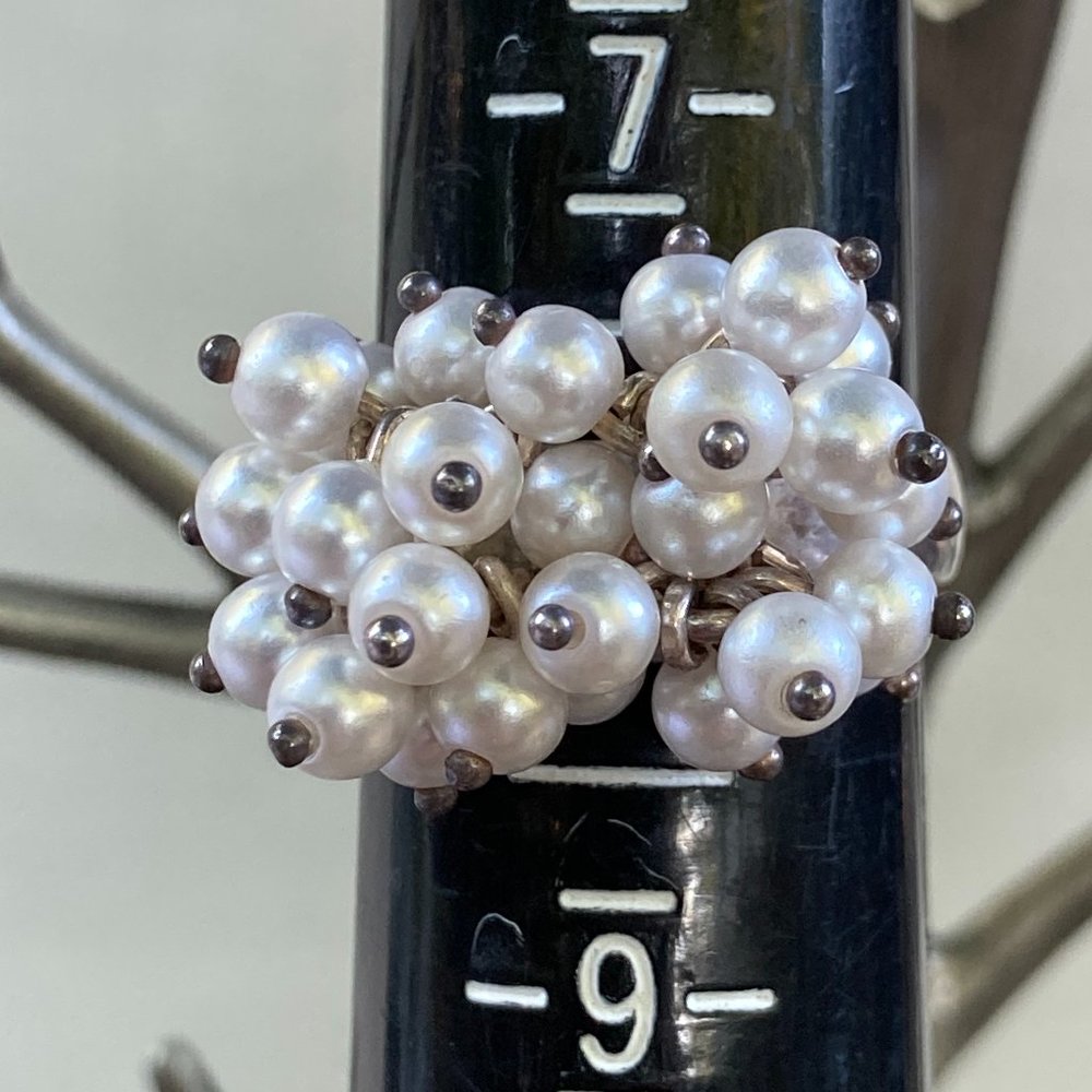 A set of cascading faux pearl earrings and silver ring w/cascading faux pearls